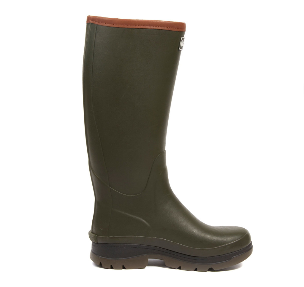 Tall dark green wellies with tan lining at the top and a thick black sole.